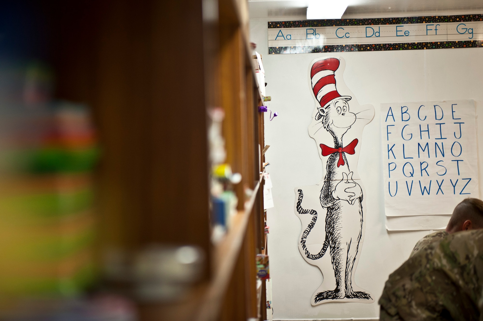 A familiar feline adorns the wall at the “Cat in the Hat” language arts center at Bagram Airfield, Afghanistan, Oct. 14, 2012. The program is a volunteer-run community outreach effort designed to provide local Afghan children a safe, nurturing learning environment in which they are inspired to bring positive change to Afghanistan. (U.S. Air Force photo/Capt. Raymond Geoffroy)