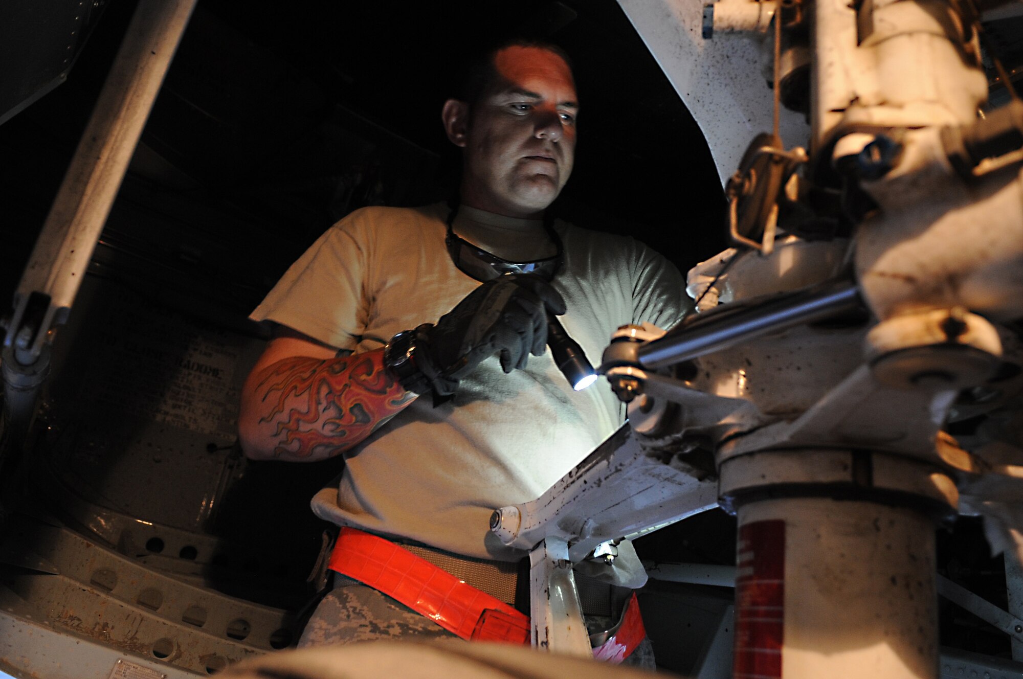 SOUTHWEST ASIA – Staff Sgt. T.J. Ogden, 386th Expeditionary Aircraft Maintenance Squadron crew chief, inspects the wheels of a C-130 Hercules after it lands here Oct. 23. C-130s must be brought into a maintenance hangar after 270 flight hours for a more thorough inspection called a “Home Station Check.” The HSC is a complete tear-down inspection of the C-130 in which maintainers carefully examine every component of the aircraft, looking for wear and tear to make sure the aircraft is safe for flight. (U.S. Air Force photo/Staff Sgt. Alexandra M. Boutte)