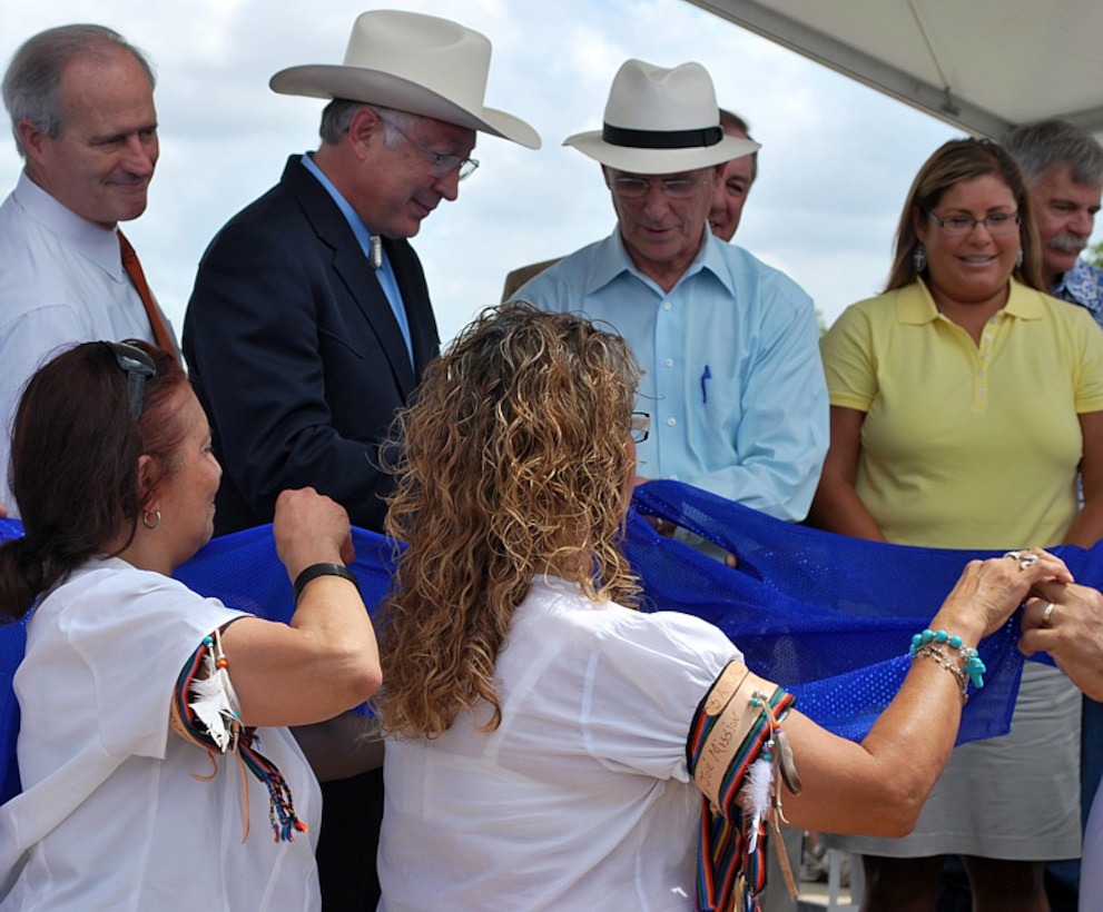 Mission Reach Ecosystem Restoration and Recreation Project Phase 1 and Phase 2 Grand Opening Ceremony held June 25 on the San Antonio River was highlighted by the surprise event participation and endorsement of support from Secretary of the Interior Ken Salazar. The Secretary announced his support for the nomination of the four historic missions within the project, the Alamo, and the river as a World Heritage site.