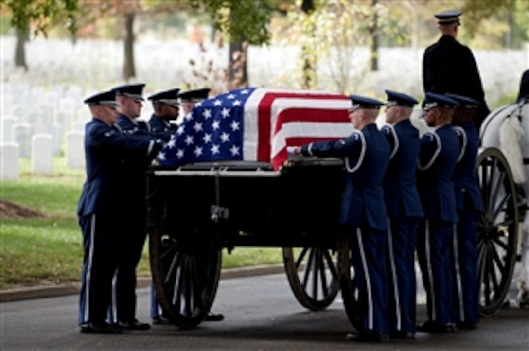 The U.S. Air Force Honor Guard's Body Bearers team prepares to remove the remains of Col. Wendell Keller, of Fargo N.D. and Capt. Virgil K. Meroney, of Fayetteville, Ark., from the caisson and carry them to their final resting place at the Arlington National Cemetery on Oct. 20, 2012.  Keller and Meroney were the crew of an F-4D Phantom II aircraft that went down while carrying out a nighttime strike mission in Khammouan Province, Laos, on March 1, 1969.  The Joint POW/MIA Accounting Command conducted several investigations and excavations of the crash site, locating human remains, military equipment, a military identification card and the wreckage of an F-4, including an engine data plate and radio call-sign plate.  Using circumstantial evidence, and forensic identification tools such as dental comparisons and radiograph comparisons JPAC was able to identify Keller and Meroney.  