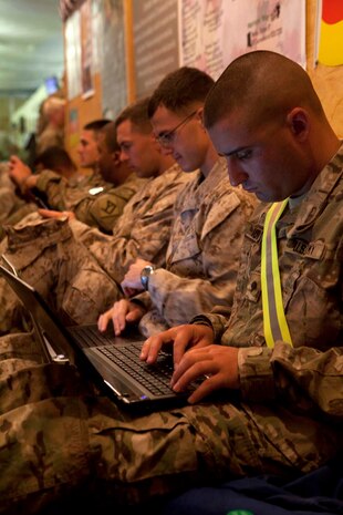 U.S. Marines and Soldiers make use of free WiFi internet provided in a morale center located on Manas Air Base, Chuy province, Kyrgyzstan, Oct. 13, 2012. Manas Air Base is a staging point for U.S. forces traveling to and from Afghanistan in support of Operation Enduring Freedom. (U.S. Marine Corps photo by Cpl. Alejandro Pena/Released)