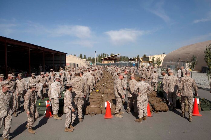 U.S. Marines with Headquarters Company, Regimental Combat Team 7 (RCT-7) stage their gear at Manas Air Base, Chuy province, Kyrgyzstan, Oct. 13, 2012. RCT-7 remained a few days on Manas Air Base before continuing on to their final destination in Afghanistan for a yearlong deployment. (U.S. Marine Corps photo by Cpl. Alejandro Pena/Released)