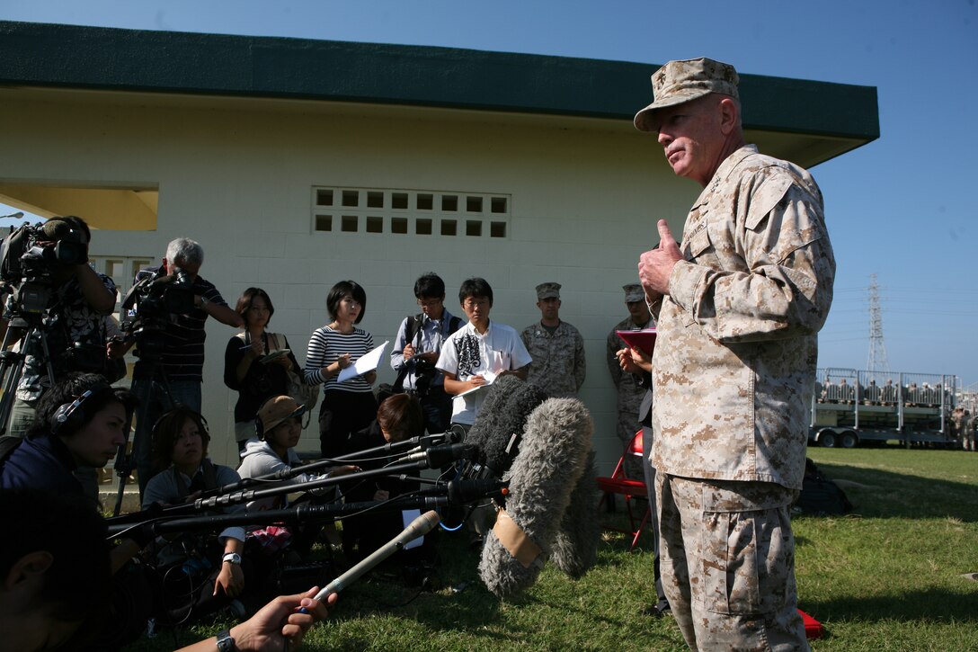 Lt. Gen. Kenneth J. Glueck, Jr. addresses Okinawan media during an all-hands period of reflection brief at Camp Foster, Okinawa, Japan Oct. 25. “I have all the trust and confidence that we will overcome this period and continue to move forward,” said Glueck. “Every Marine on Okinawa became a diplomat the moment they landed on Okinawa. Conduct yourselves accordingly when interacting with our hosts and be the best diplomat you can be for our country and service.” Glueck plans to visit all Marine installations on island within the week to address recent alleged sexual assault incidents and the resulting liberty policy changes while emphasizing the role of service members as ambassadors on Okinawa. Glueck is the III Marine Expeditionary Force commanding general.