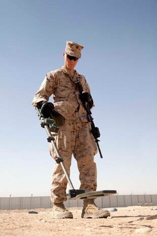 U.S. Navy Hospital Corpsman 3rd Class, Headquarters Company, Regimental Combat Team 7, practices using a metal detector during the practical application portion of an improvised explosive device (IED) detection class at Camp Leatherneck, Helmand province, Afghanistan, Oct. 15, 2012. The class was part of counter IED training which familiarized the Marines with fundamentals to include: unexploded ordnance recognition, enemy tactics, homemade explosives, threat detection, ground signs awareness, and downed vehicle procedures. (U.S. Marine Corps photo by Cpl. Alejandro Pena/Released)