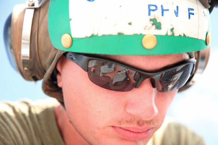 Cpl. Joseph S. Lorenzen, a Marine All-Weather Fighter Attack Squadron 225 F/A-18D Hornet airframes mechanic, troubleshoots a VMFA(AW)-225 F/A-18D Hornet during Exercise Island Fury aboard Andersen Air Force Base Oct. 19, 2012.