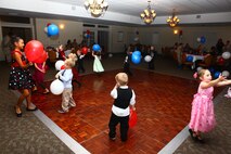 Children of Marines of Marine Medium Tiltrotor Squadron 263 learned about Marine Corps traditions and danced the night away at a children's Marine Corps Ball held at the Marine Corps Air Station New River Officers' Club, Oct. 20.