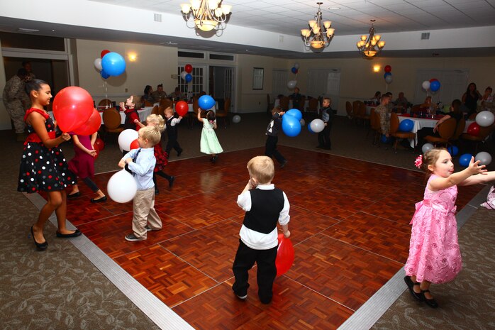 Children of Marines of Marine Medium Tiltrotor Squadron 263 learned about Marine Corps traditions and danced the night away at a children's Marine Corps Ball held at the Marine Corps Air Station New River Officers' Club, Oct. 20.