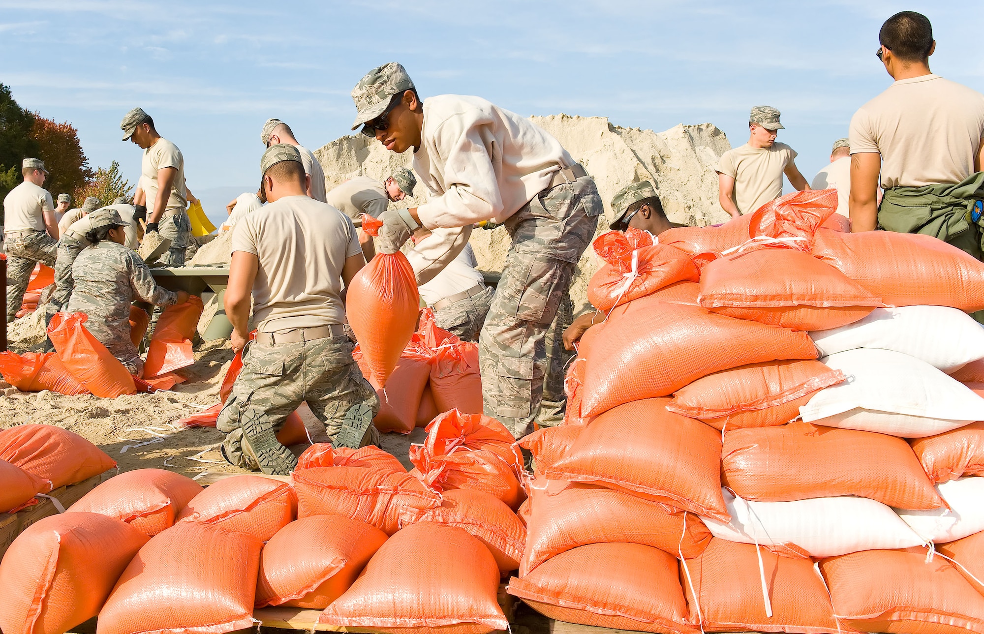 Team Dover members build sandbags Oct. 26, 2012, at Dover Air Force Base, Del.,  in preparation for the possible arrival of Hurricane Sandy. (U.S. Air Force photo by Roland Balik)