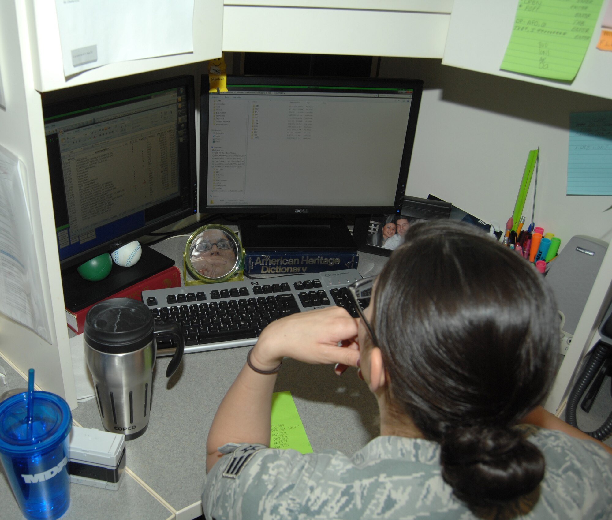 U.S. Air Force Senior Airman Danielle McLucas, 355th Comptroller Squadron accounting technician, works on her computer on Davis-Monthan Air Force Base, Ariz. Oct. 25. Airman McLucas works in the financial management analysis flight section of the 355th CPTS. They are the focal point for all audits conducted on base. (U.S. Air Force photo by Senior Airman Michael Washburn/Released)