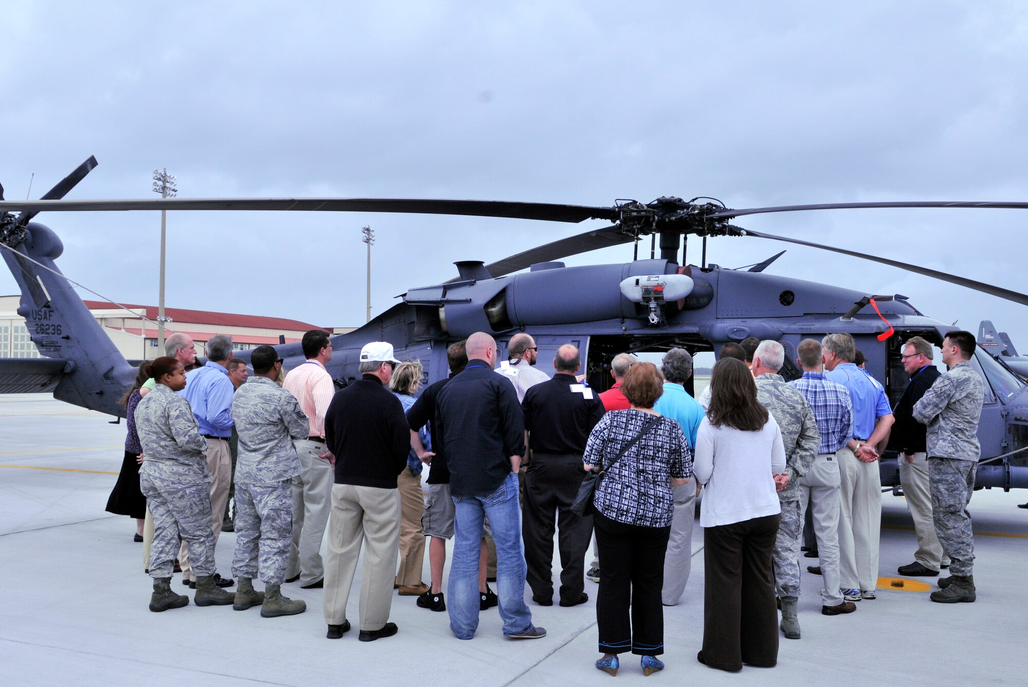 Civic leaders from the 94th Airlift Wing Dobbins Air Force Base Ga., get up close and personal with a HH-60G Pave Hawk rescue helicopter. The civic leaders spent two days at Patrick AFB, Fla., becoming familiar with the wing’s combat and humanitarian rescue mission. The 920th RQW is the only rescue wing in the Air Force Reserve and performs more than 20 percent of the combat rescues throughout the world and has saved more than 3,000 lives. (U.S. Air force photo/Tech. Sgt. Peter Dean) 
