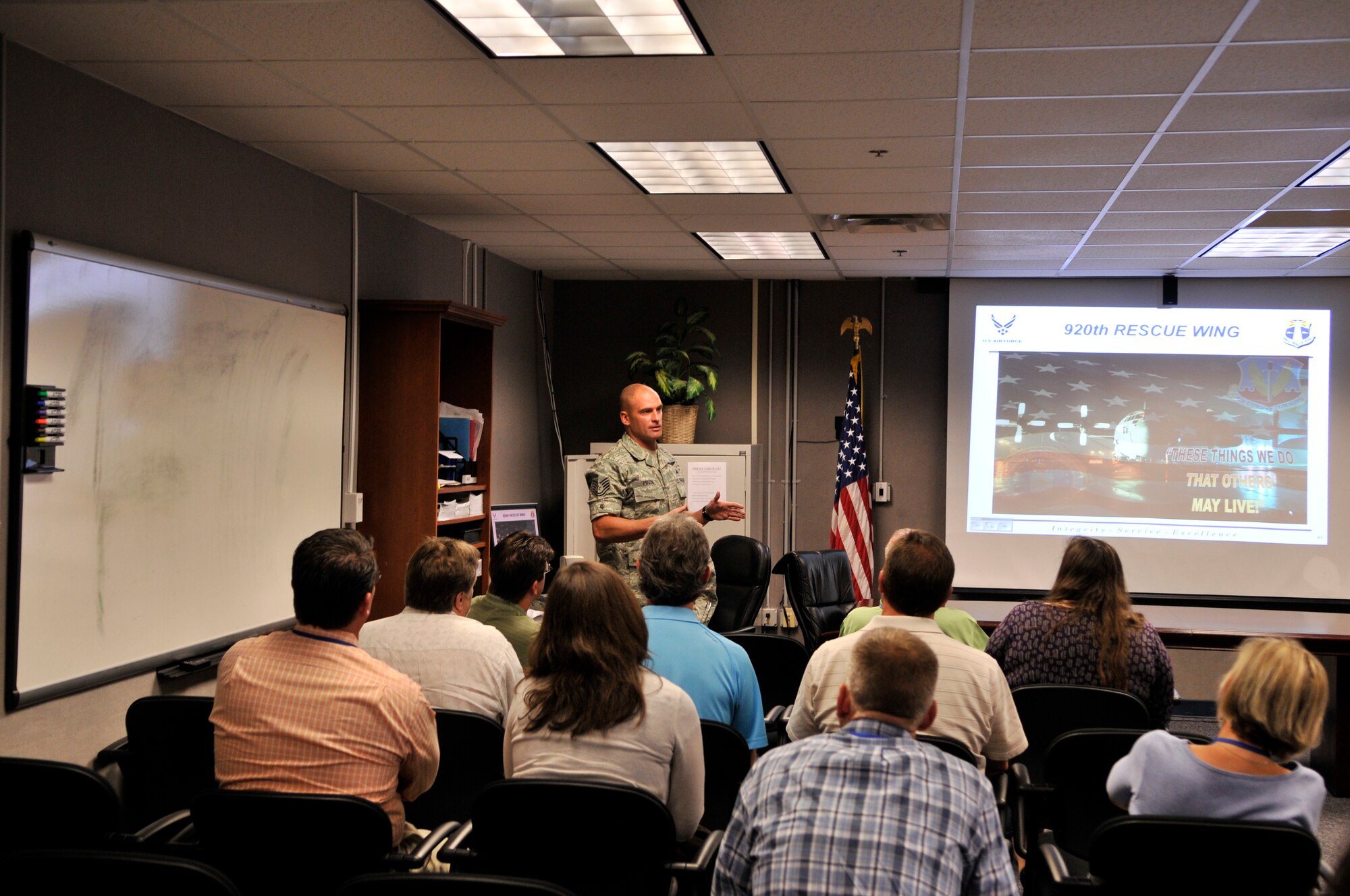 Pararescueman Tech. Sgt. William Posch, 920th Rescue Wing, addressed questions from a group of civic leaders. The group traveled from Dobbins Air Force Base, Ga., for a greater understanding of the Air Force Reserve rescue mission. (U.S. Air force photo/Tech. Sgt. Peter Dean)
