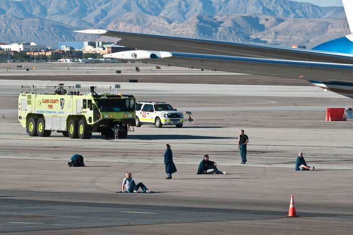 More than 60 volunteers from Nellis Air Force Base wait to receive simulated medical care during the 2012  Triennial Emergency Preparedness Exercise at McCarran International Airport Oct. 24, 2012, in Las Vegas, Nev. The exercise is conducted every three years by the Clark County Department of Aviation to maintain safety and emergency response readiness in order to maintain the Federal Aviation Administration certification.    (U.S. Air Force photo by Airman 1st Class Jason Couillard)