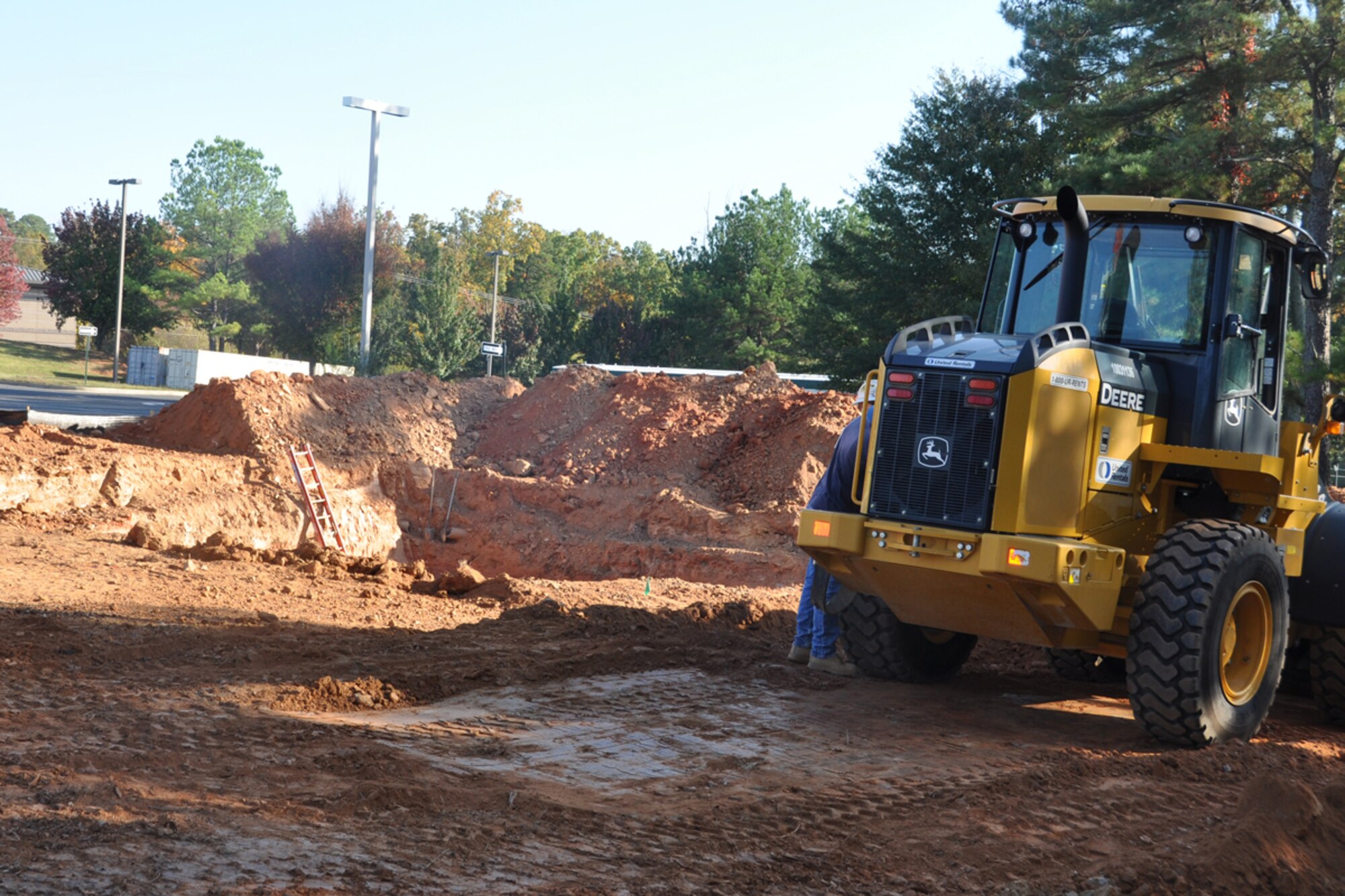 Contractors from Newkirk Electric dig at the site of the new Digital Air Surveillance Radar (DASR) Tower near building 557, Oct. 26. The tower, operated by the 94th Communications Squadron, will have updated equipment, to include digital vs. analog capability, and will be more energy efficient. Completion of the tower construction is expected mid 2013. (U.S. Air Force photo/James Branch)