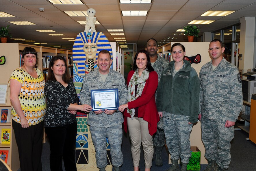 RAF MENWITH HILL, United Kingdom – The Menwith Hill Library Team staff was named the October 501st Combat Support Wing Everyday Hero from the 421st Air Base Group. The base library has been without a head librarian and an assistant librarian for over 10 months. Despite the lack of expertise, the library team has maintained superb service to the base populace. (U.S. Air Force photo by Staff Sgt. Brok McCarthy)