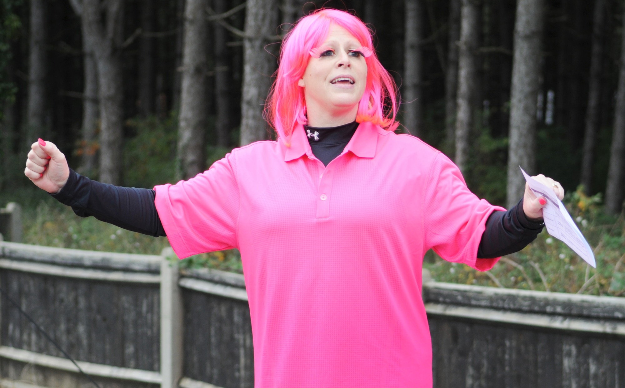 Jennifer Matney, 100th Force Support Squadron Bob Hope Community Center events coordinator, announces the start of the Wear Pink Breast Cancer Awareness 5/10K Walk Oct. 26, 2012, at RAF Mildenhall, England.  Approximately 200 base members attended the event sporting various pink clothing combinations to support Breast Cancer Awareness month.  (U.S. Air Force photo by Staff Sgt. Tabitha M. Lee/Released)