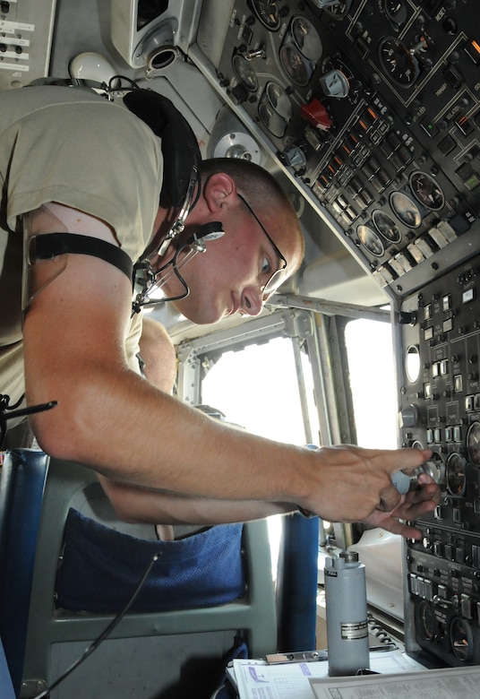 SOUTHWEST ASIA - U.S. Air Force Senior Airman Daniel Phelps, 380th Expeditionary Aircraft Maintenance Squadron guidance and control technician, exchangesa fuel quantity indicator on an E-3 Sentry before a 970th Expeditionary Airborne Air Control Squadron training flight Oct. 24, 2012. Seven of the eight E-3 crews here come from Tinker Air Force Base, Okla., along with support personnel including aircraft maintainers. (U.S. Air Force photo/Tech. Sgt. Amanda Savannah)