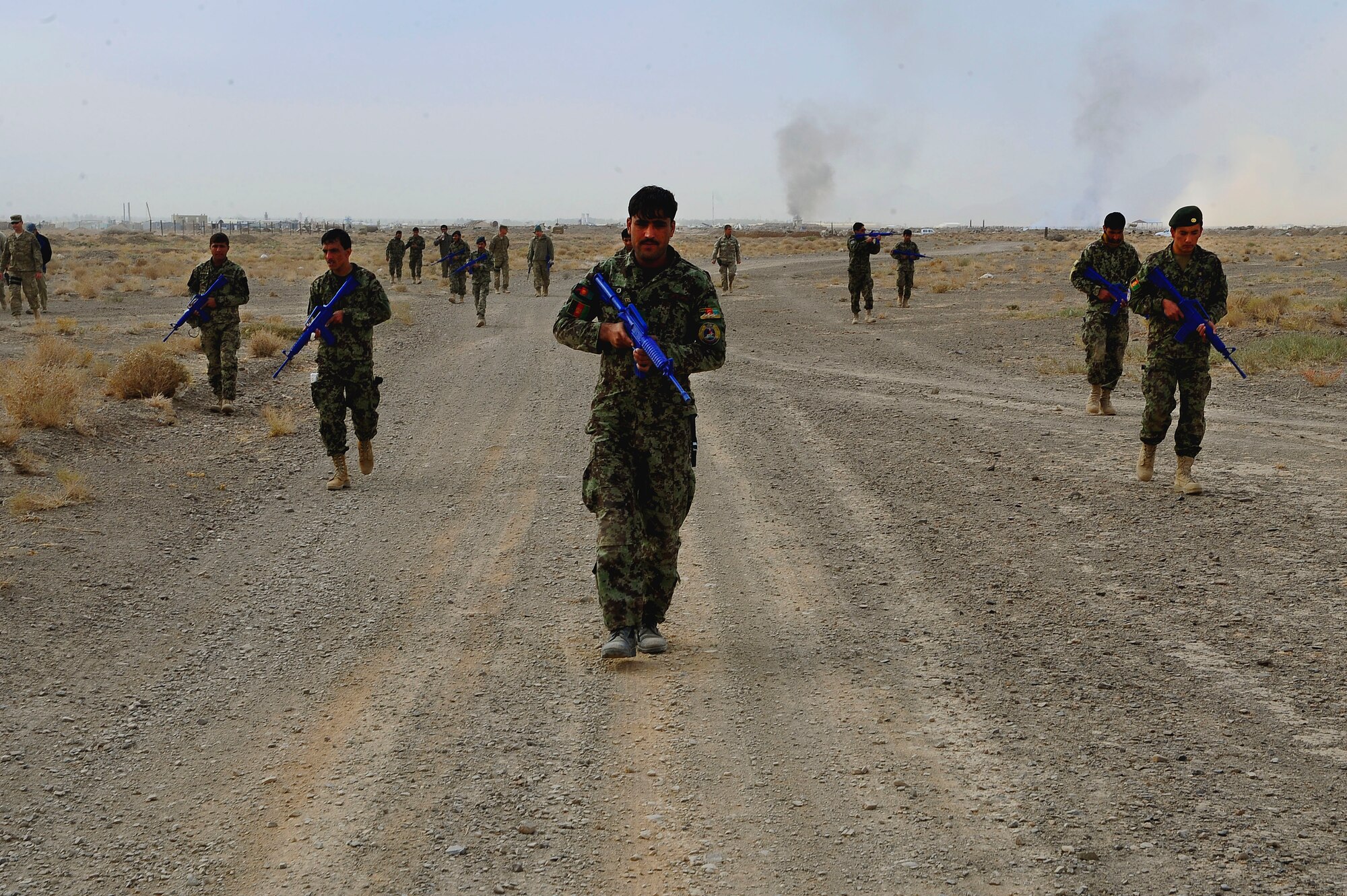 Afghan Air Force Security Forces Soldier Said Ahmad leads the formation during a foot patrol during their field training exercise, Oct. 18, 2012 at Shindand Air Base, Afghanistan. This was an initial security and tactical training culmination exercise for the Shindand Air Wing Security Forces. (U.S. Air Force photo/ Tech. Sgt. Quinton Russ/RELEASED)