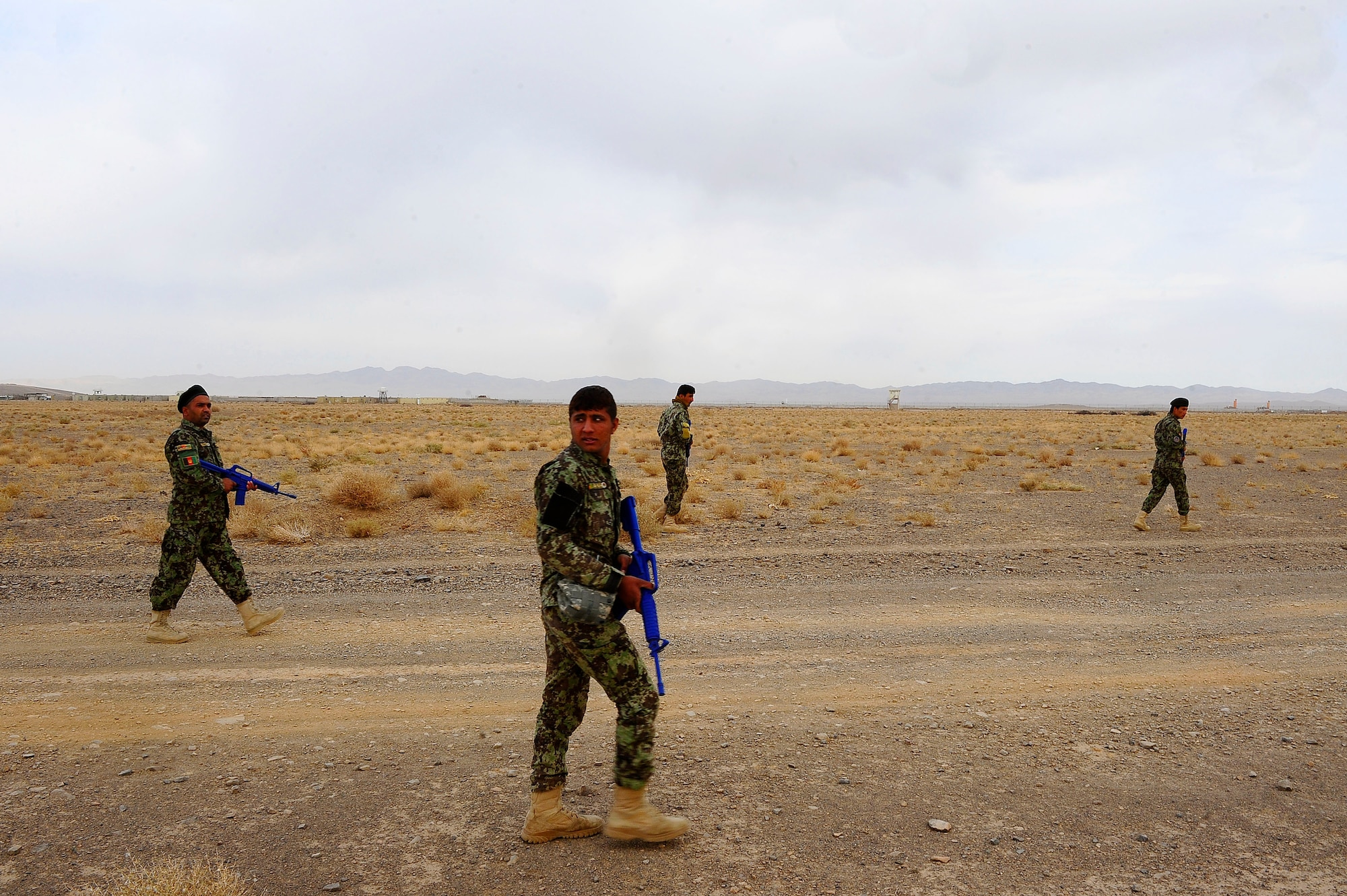 Members of the Afghan Air Force 81st Security Kandak walk on a patrol during their field training exercise, Oct. 18, 2012 at Shindand Air Base, Afghanistan. This was an initial security and tactical training culmination exercise for the Shindand Air Wing Security Forces. (U.S. Air Force photo/ Tech. Sgt. Quinton Russ/RELEASED)