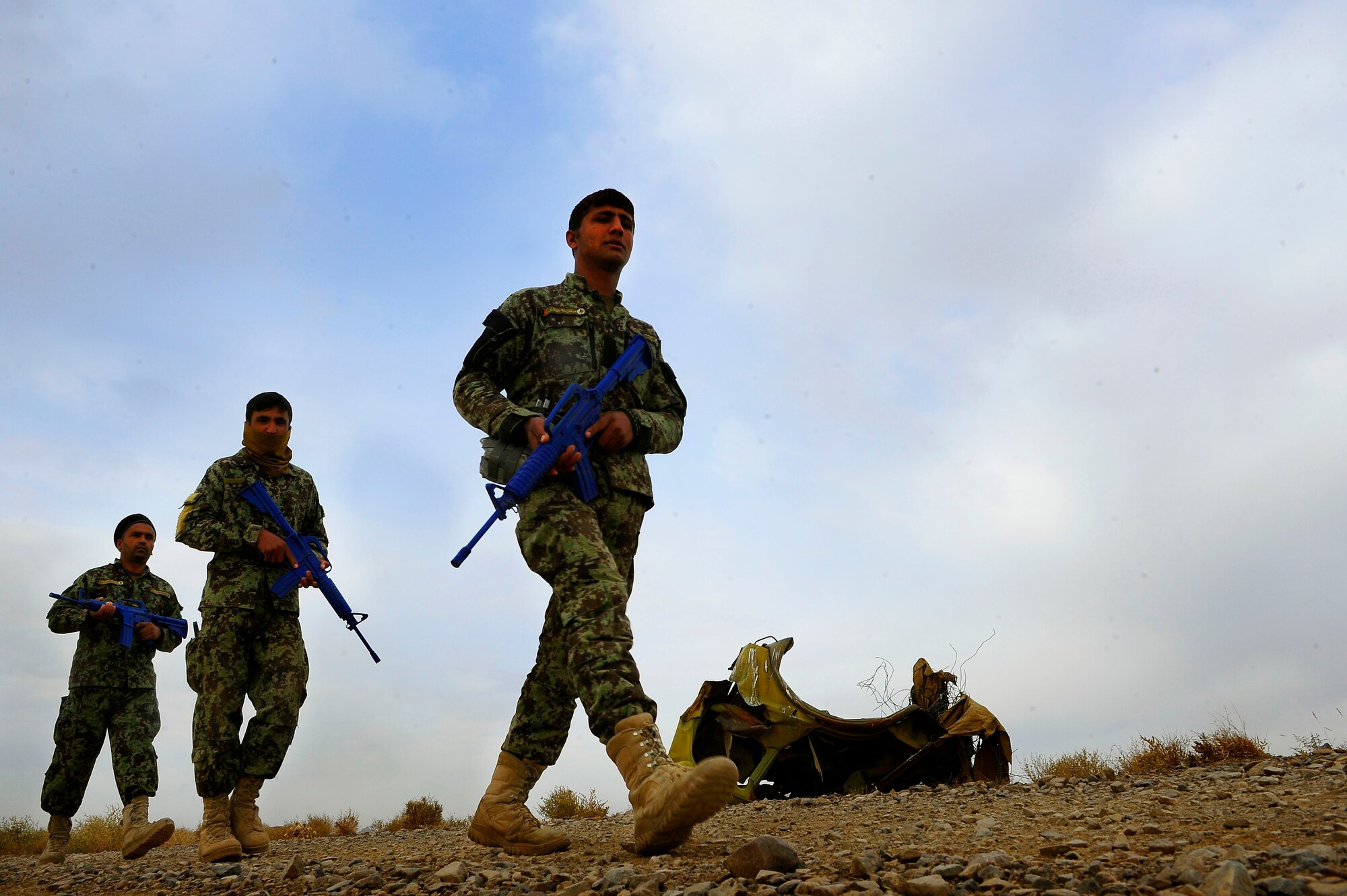 Members of the Afghan Air Force 81st Security Kandak walk on a patrol during their field training exercise, Oct. 18, 2012 at Shindand Air Base, Afghanistan. This was an initial security and tactical training culmination exercise for the Shindand Air Wing Security Forces. (U.S. Air Force photo/ Tech. Sgt. Quinton Russ/RELEASED)