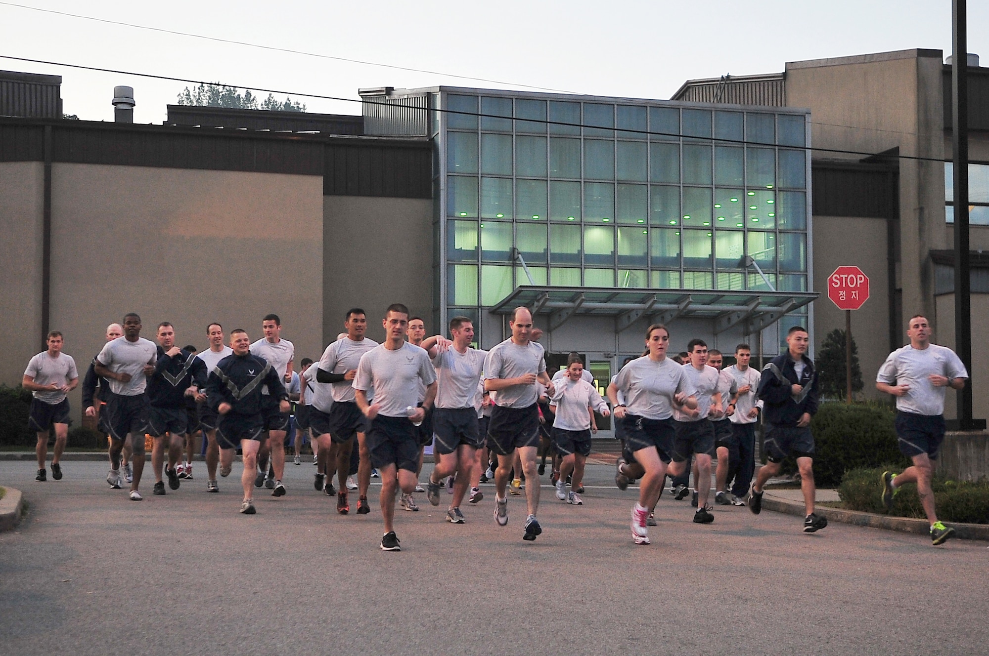 Members from Team Osan participate in an energy awareness 5K run Oct. 3, 2012. October is Energy Awareness month and Osan has installed smart meters, low-draw induction lights, detected water leaks, and researched possible clean energy sources to contribute to energy savings. (U.S. Air Force photo/Tech. Sgt. Raymond Mills)