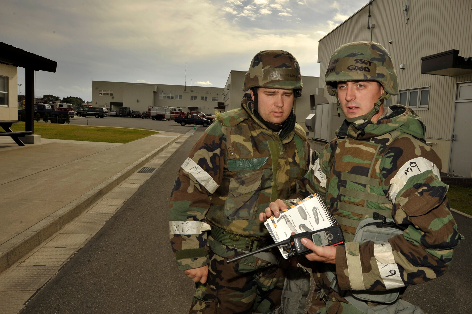 U.S. Air Force Staff Sgt. Cory Good, right, and Staff Sgt. Lennon Brixey, 35th Civil Engineer Squadron, identify an unexploded ordinance mock up during a Prime Base Engineer Emergency Forces exercise at Misawa Air Base, Japan, Oct. 18, 2012. The 35 CES practiced life saving skills, UXO detection and disposal, firefighting and damage assessment during the exercise. (U.S. Air Force photo by Staff Sgt. Nathan Lipscomb)