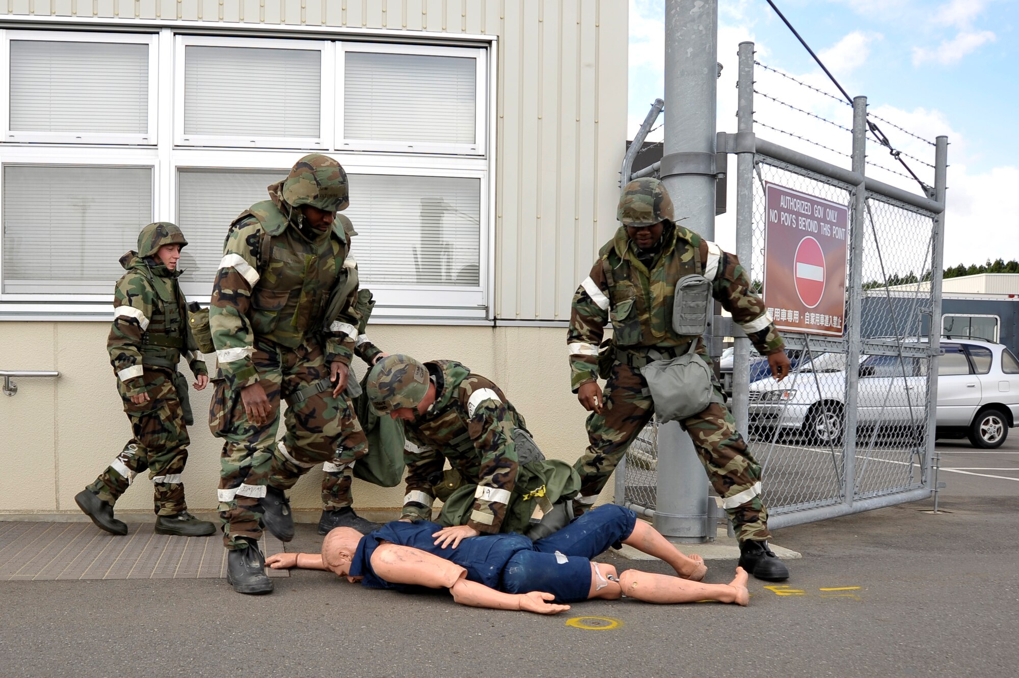 U.S. Air Force Airmen from the 35th Civil Engineer Squadron find a simulated victim during a Prime Base Engineer Emergency Forces exercise at Misawa Air Base, Japan, Oct. 18, 2012.  The 35 CES holds monthly Prime BEEF exercises to sharpen skills needed for emergency situations. (U.S. Air Force photo by Staff Sgt. Nathan Lipscomb) 