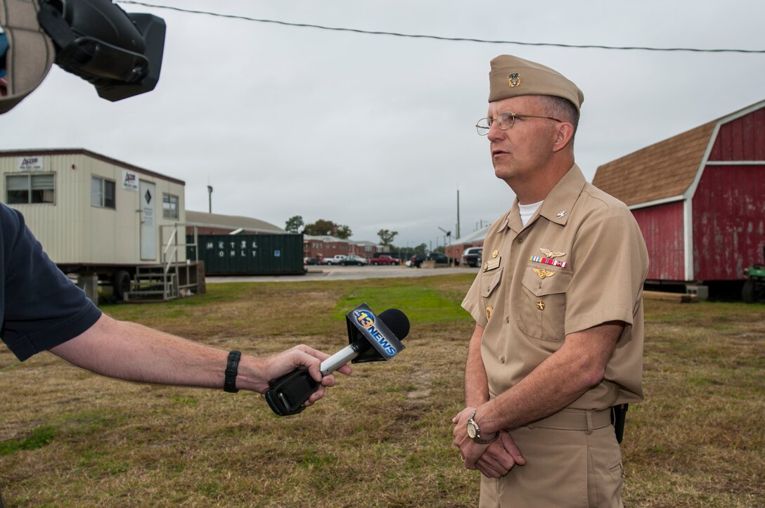 Navy Capt. Michael Johansson, commanding officer, Naval Support Activity Hampton Roads in Virginia, discusses preparations for Hurricane Sandy.  U.S. Navy photo by Petty Officer 3rd Class Billy Ho