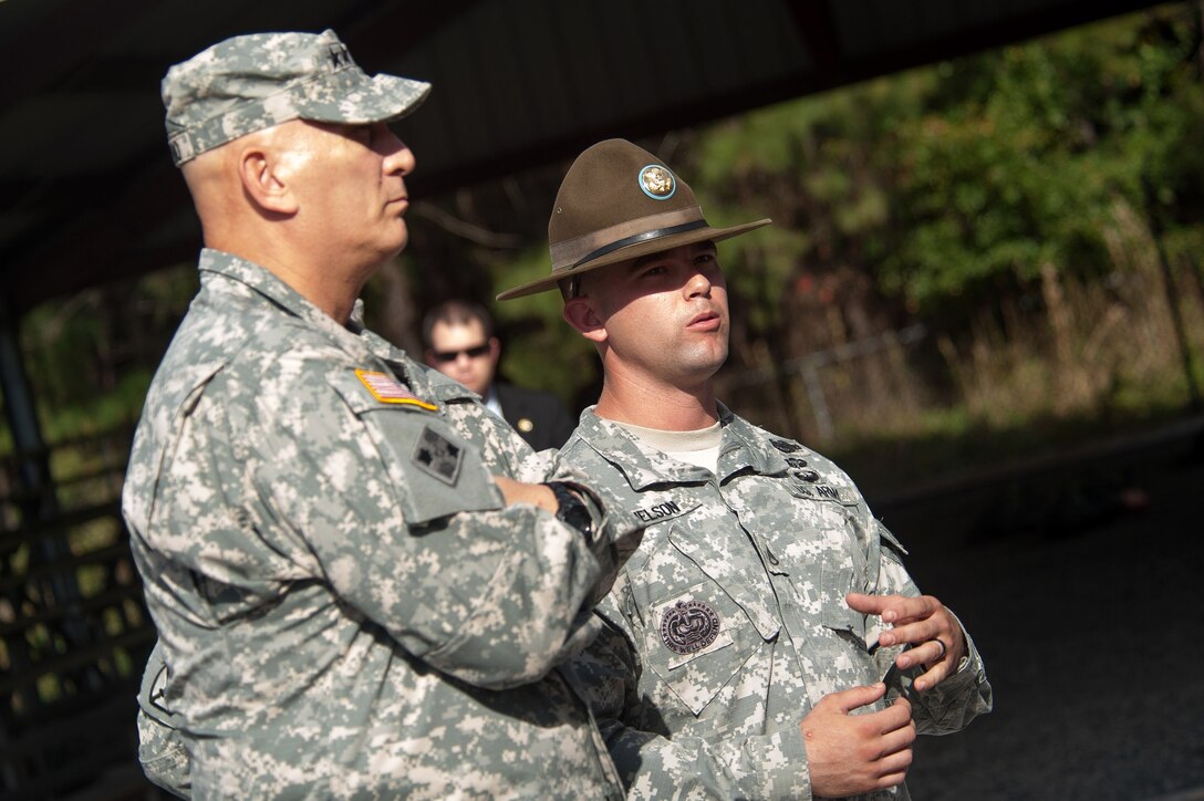 Army Staff Sgt. Christopher Nelson, right,  briefs Army Chief of Staff Gen. Ray Odierno as he observes basic training on Fort Jackson, S.C., Oct. 25, 2012. Nelson, a drill sergeant, is assigned Company E, 1st Battalion, 61st Infantry Regiment.