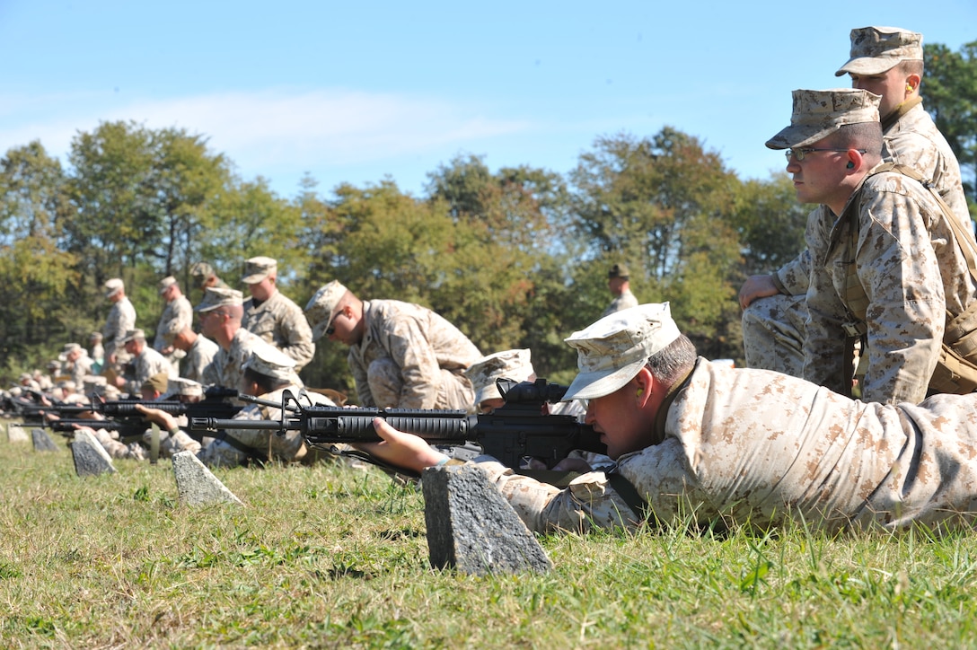 Reserve Marines begin their preparation time while on the rifle range as a part of their Combat Marksmanship Coaches Course training at the Weapon’s Training Battalion on Oct. 8. At the completion of the course the Marines will have the title of “range coach.”


