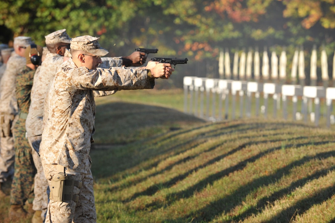 Marines begin their rifle qualification after learning knowledge from their Combat Marksmanship Coaches Course training at the Weapon’s Training Battalion on Oct. 8. Marines came from all across the country to attend the course. 