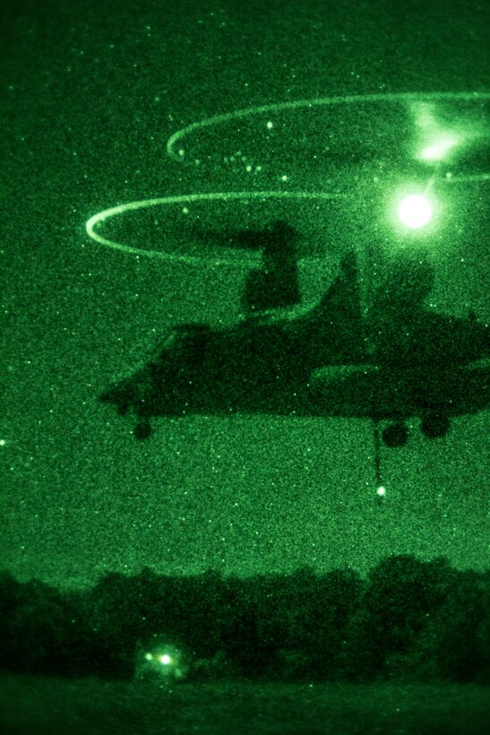 Marines of Combat Logistics Battalion (CLB) 26 practice suspending five ton water bladders beneath an MV-22B with Marine Medium Tiltrotor Squadron (Reinforced) 266 at Camp Lejeune, N.C., 23 Oct., 2012. CLB-26 and VMM-266 (Rein) are reinforcements of 26th MEU, which is slated to deploy in 2013.