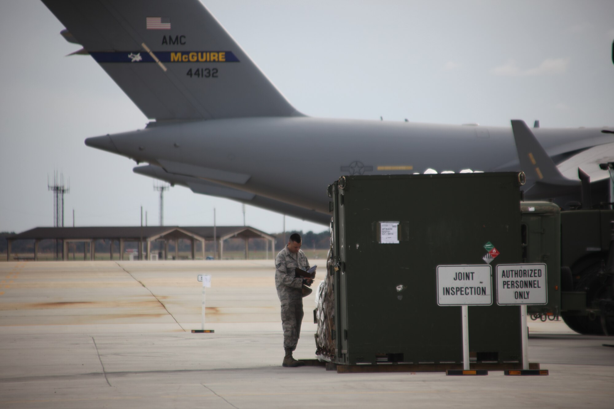 Staff Sgt. Sheldon Fowler, 305th Aerial Port Squadron joint inspector, from Skidmore, Texas, inspects generators to ensure sure they are air capable. 305th APS Airmen worked to get get gear ready for evacuation and storage before the arrival of Hurricane Sandy.

(U.S. Air Force photo by 2nd Lt. David J. Murphy/Released)