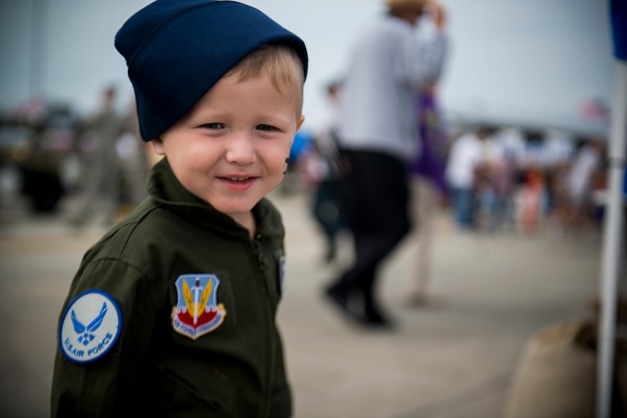 Beau Newport, son of Airman 1st Class Alex Newport, 23d Aircraft Maintenance Squadron crew chief, smiles for the camera during the Moody Air Force Base, Ga., Legacy of Liberty Open House air show Oct. 27, 2012. Many of Team Moody’s families came out to enjoy the show. (U.S. Air Force photo by Staff Sgt. Jamal D. Sutter/Released) 