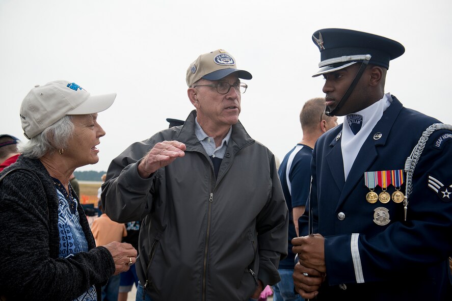 Senior Airman Marcus Miles, U.S. Air Force Honor Guard Drill Team member, speaks with Robert and Ruth Dykes during the Moody Air Force Base, Ga., Legacy of Liberty Open House air show Oct. 27, 2012. The couple traveled more than 500 miles from Johnson City, Tenn., to attend the Moody air show. (U.S. Air Force photo by Staff Sgt. Jamal D. Sutter/Released)