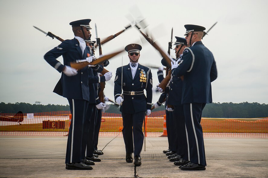 Members of the U.S. Air Force Honor Guard Drill Team perform during the Moody Air Force Base, Ga., Legacy of Liberty Open House air show Oct. 27, 2012. The team executed its act at center stage to begin the event just before the singing of the national anthem. (U.S. Air Force photo by Staff Sgt. Jamal D. Sutter/Released)