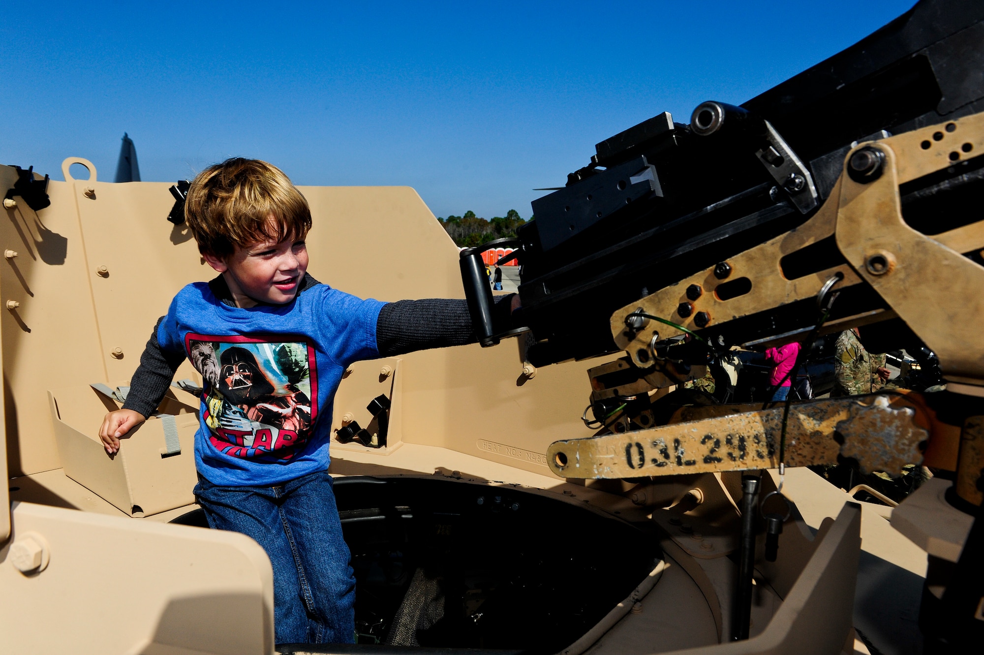 Gates Chipser, son of Brett Chipser, gets a close up look at a vehicle mounted weapon during the Hurlburt Field Open House at Hurlburt Field, Fla., Oct. 27, 2012. The Open House gave the public an inside look at Hurlburt Field?s many missions and allowed Team Hurlburt to show appreciation to the local community and provide families an activity that members of all ages can enjoy. (U.S. Air Force photo/Airman 1st Class Christopher Williams)
