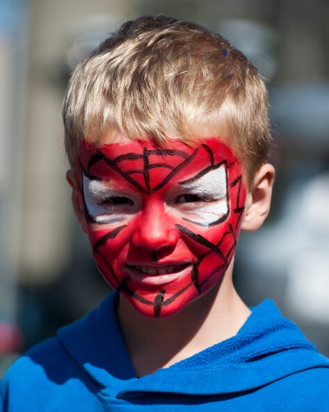 Robert Cademartori, son of Tech. Sgt. Allison Cademartori, contract specialist from 1st Special Operations Communications Squadron, stands in line after getting his face painted to resemble spider man during the Team Hurlburt Open House at Hurlburt Field, Fla., Oct. 27, 2012. Team Hurlburt?s Open House gave the public an inside look at the 1st Special Operations Wing and some of the other units located at Hurlburt Field. Ground displays of several types of Special Operations aircraft including the AC-130U Spooky Gunship and the CV-22 Osprey, as well as various other types of specialized military equipment from across base were featured. (U.S. Air Force photo/Airman 1st Class Christopher Williams)
