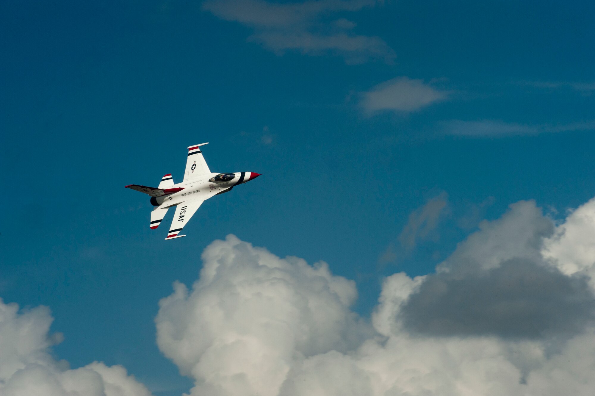 An F-16C/D Fighting Falcon with the U.S. Air Force Thunderbirds Flight Demonstration Team  flies over the skies of Moody Air Force Base, Ga., Oct. 25, 2012, while waiting for other members to land. The Thunderbirds will perform on Oct. 27-28 during Moody’s Open House air show. (U.S. Air Force photo by Airman 1st Class Paul Francis/Released) 
