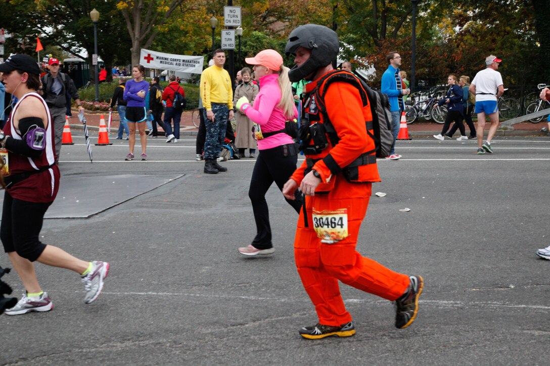 Dr. Travis Taylor from the show “Rocket City Rednecks,” runs the 37th Marine Corps Marathon Oct. 28 in a 40-pound suit of body armor he and his colleagues designed. Taylor and his crew is working on a light-weight, maneuverable, full body armor that protects extremities as well as the torso.

