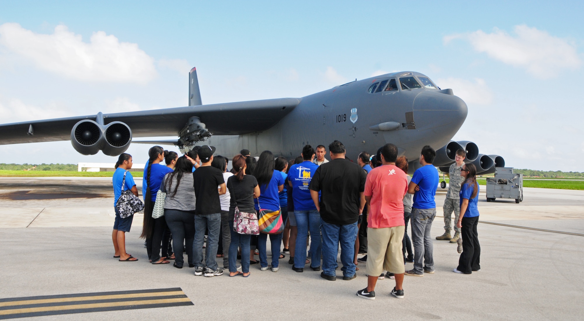 ANDERSEN AIR FORCE BASE, Guam – Students and chaperons from the Guam Community College listen as Airman 1st Class Elliot Williams, 36th Expeditionary Aircraft Maintenance Squadron, explains his job as a dedicated B-52 Stratofortress crew chief on the flightline here, Oct. 19. The students and chaperons visited the base for a career advancement tour. (U.S. Air Force photo/Airman 1st Class Marianique Santos/Released)