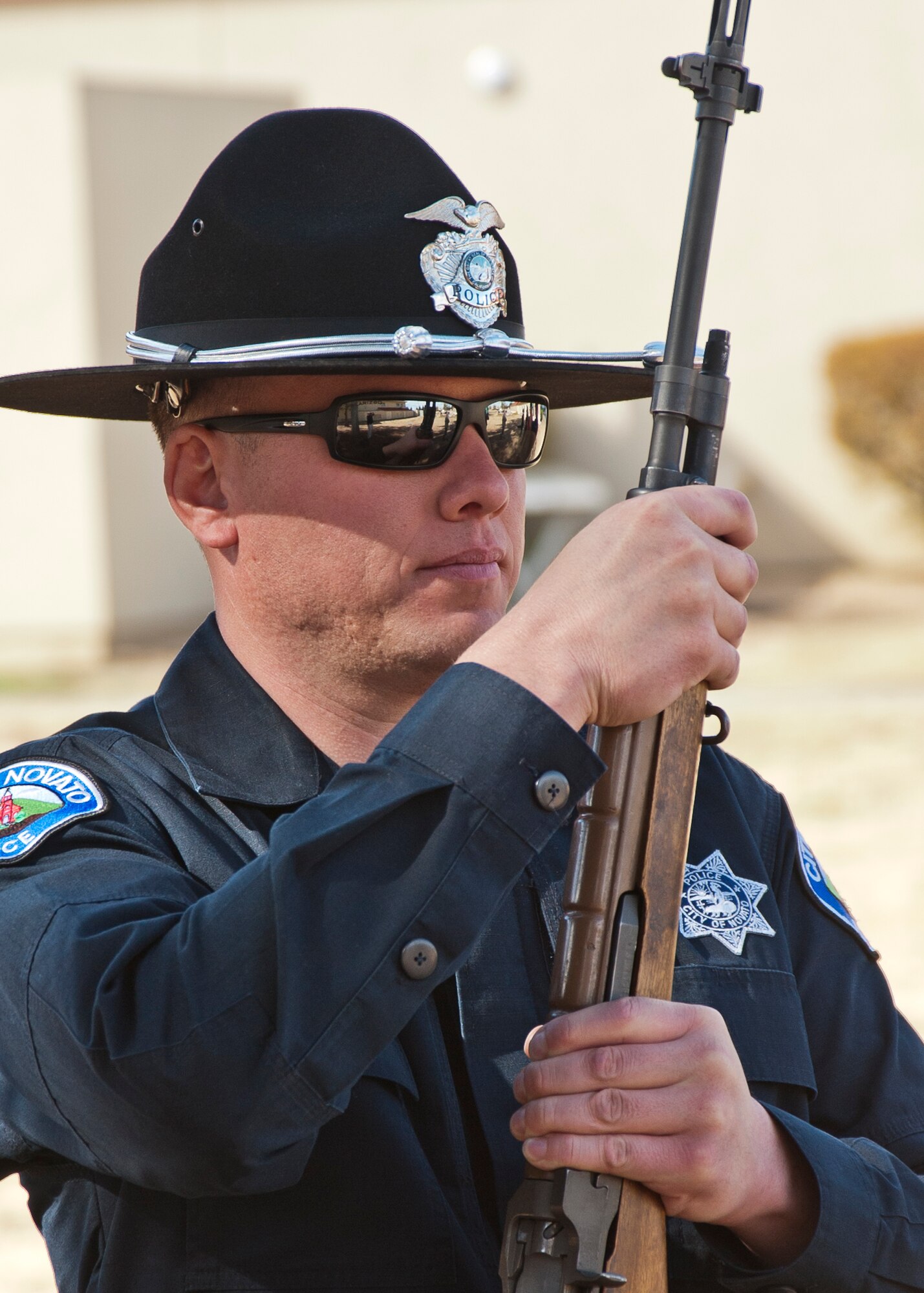 Officer Michael Ramirez, Novato Police Department takes part in Fire Party training with the Travis Air Force Base Honor Guard. (Released - U.S. Air Force Photograph/Heide Couch)