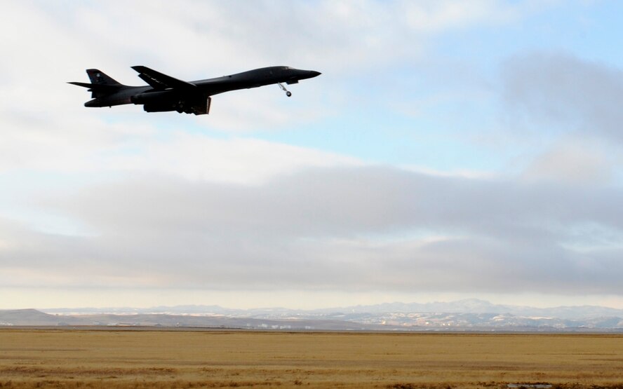 A B-1 bomber takes to the skies to participate in a Green Flag training exercise at Nellis Air Force Base, Nev., from the flightline at Ellsworth Air Force Base, S.D., Oct. 25, 2012. The exercise is designed to ensure aircrews and maintenance personnel are prepared to carry out the 28th Bomb Wing's mission both at home and in a deployed environment. (U.S. Air Force photo by Airman Ashley J. Woolridge/Released)