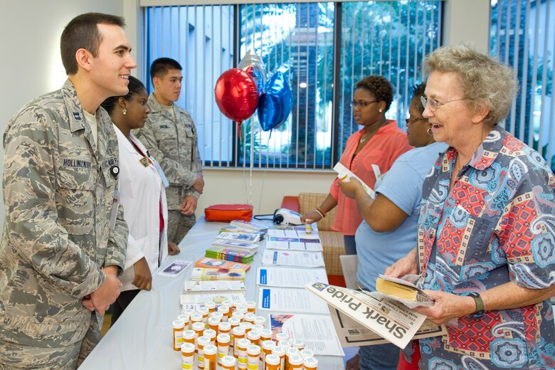 Capt. Adam Hollingsworth, 45th Medical Support Squadron staff pharmacist,
displays the vital role pharmacists play as he discusses medications to take
and which not to mix with a patient.  
