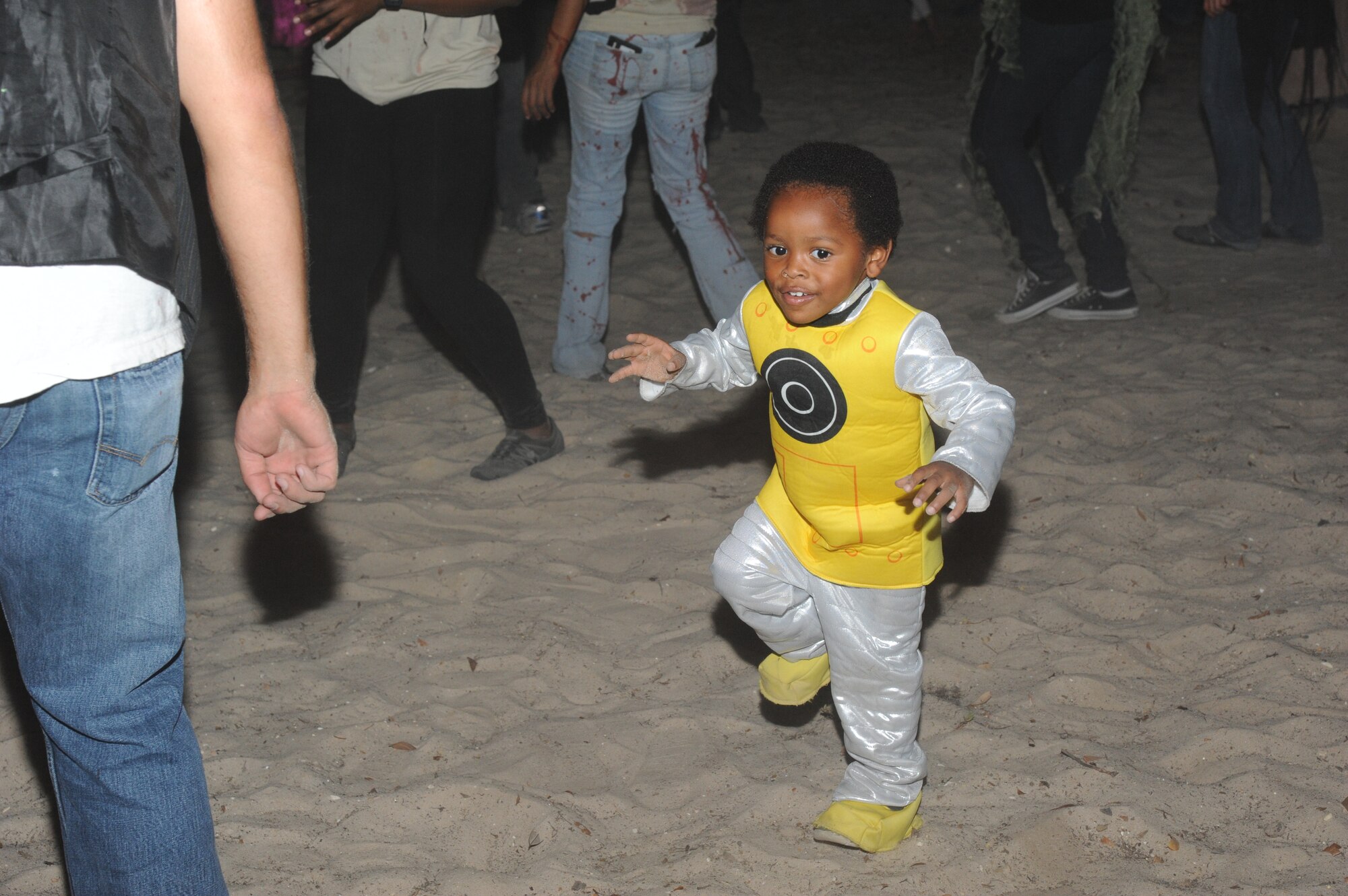 Two-year-old Xavier Drinkard, son of Dorothy and Senior Airman LaDarrius Drinkard, 81st Aerospace Medicine Squadron, “breaks it down” as a song is played at Ghouls in the Park Oct. 26, 2012, at the Marina Park, Keesler Air Force Base, Miss.  The event included a haunted house, trunk or treat, hay ride and music.  (U.S. Air Force photo by Kemberly Groue)