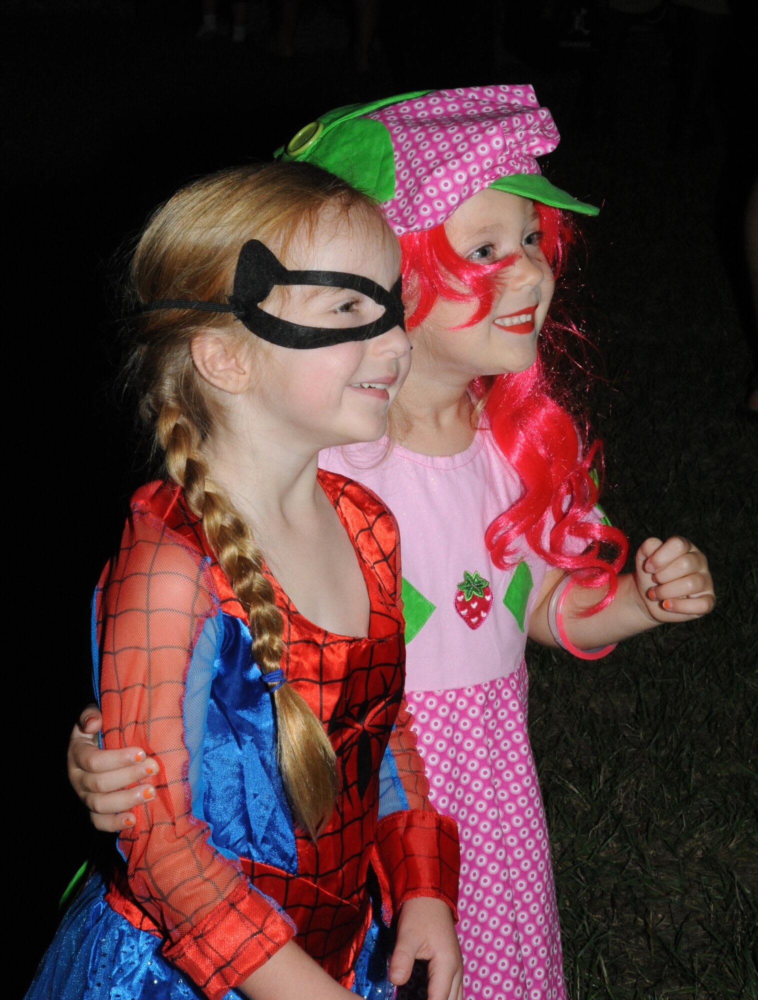 Ava Lynn Stryker, 4, dressed up as “spider girl” and her friend, Addie Iovieno, 4, dressed up as “strawberry shortcake” at Ghouls in the Park Oct. 26, 2012, at the Marina Park, Keesler Air Force Base, Miss.  The event included a haunted house, trunk or treat, hay ride and music.  Ava Lynn’s parents are Rebecca Stryker, 81st Force Support Squadron, and Staff Sgt. Brian Stryker, 334th Training Squadron.  Addie’s parents are Staff Sgts. Ashley Iovieno, 81st Medical Support Squadron and Kristopher Iovieno, 81st Medical Operations Squadron.  (U.S. Air Force photo by Kemberly Groue)