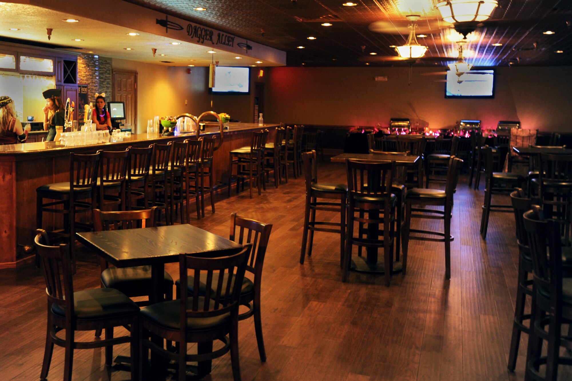 Bartenders prepare for the Mad Scientist Halloween Party at Cannon Air Force Base, N.M., Oct. 26, 2012.  This event was in celebration of the Landing Zone's renovated bar re-opening. (U.S. Air Force photo/Jette Carr)