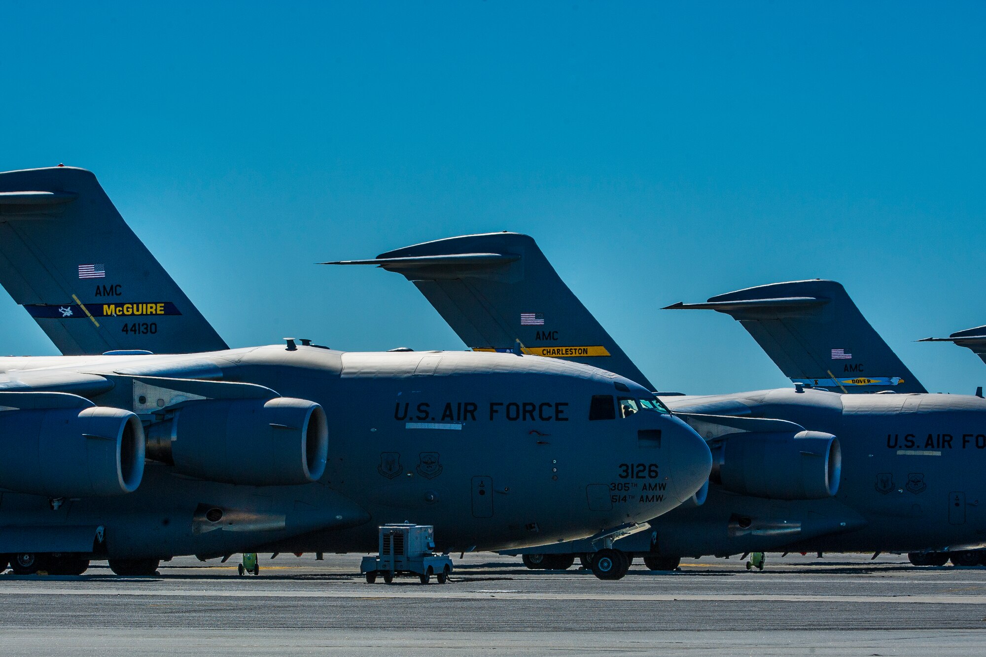C-17 Globemaster IIIs sit on the tarmac Oct. 29, 2012, at Joint Base Charleston - Air Base. C-17s from Joint Base McGuire-Dix-Lakehurst and Dover Air Force Base landed here over the weekend because of the intensity of Hurricane Sandy affecting the Northeast. (U.S. Air Force photo/ Airman 1st Class George Goslin)