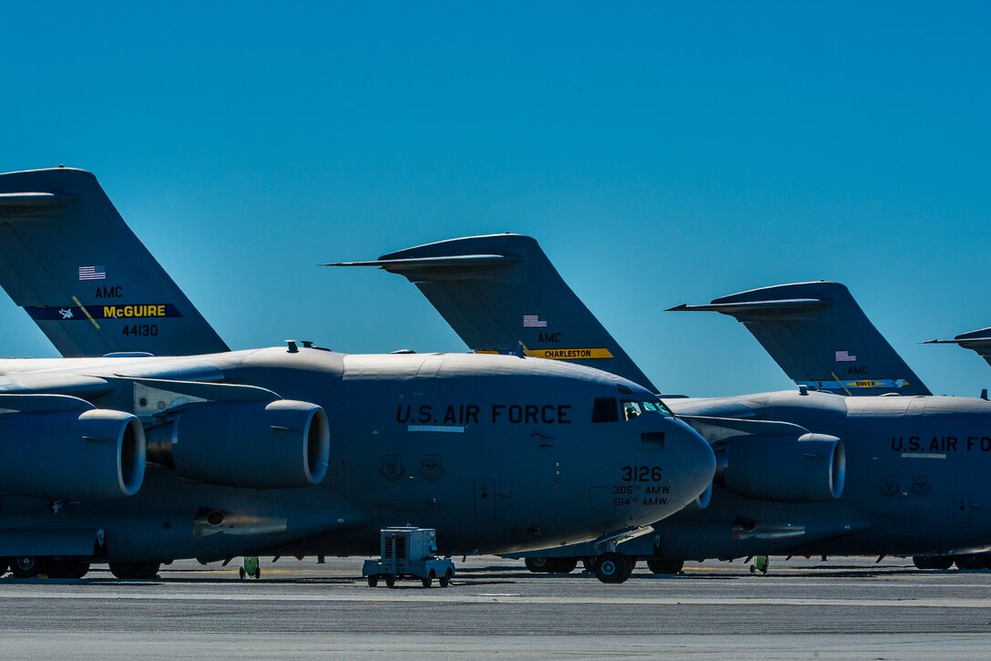 C-17 Globemaster IIIs sit on the tarmac Oct. 29, 2012, at Joint Base Charleston - Air Base. C-17s from Joint Base McGuire-Dix-Lakehurst and Dover Air Force Base landed here over the weekend because of the intensity of Hurricane Sandy affecting the Northeast. (U.S. Air Force photo/ Airman 1st Class George Goslin)