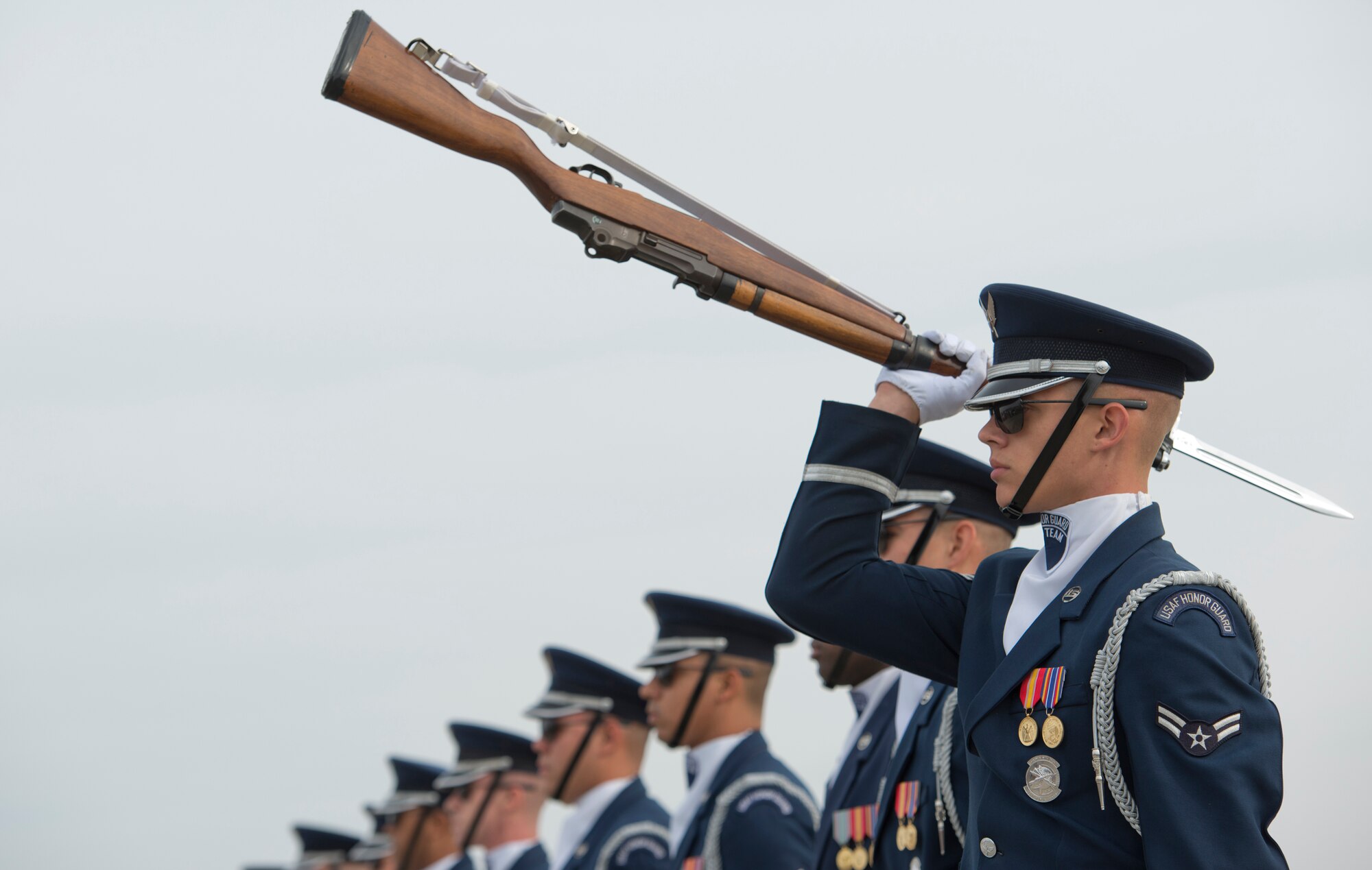 Members of the U.S. Air Force Honor Guard Drill Team perform during the Moody Air Force Base, Ga., Legacy of Liberty Open House air show Oct. 27, 2012. The team executed its act at center stage to begin the event just before the singing of the national anthem. (U.S. Air Force photo by Senior Airman Douglas Ellis/Released)
