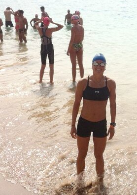 Cadet 1st Class Samantha Morrison gets ready to swim with the 2,000 other swimmers at the Iron Man Triathlon in Kailua-Kona, Hawaii, Oct. 13, 2012. Morrisson is assigned to Cadet Squadron 06 and is the Air Force Academy's 102 triathlete. (Courtesy photo)